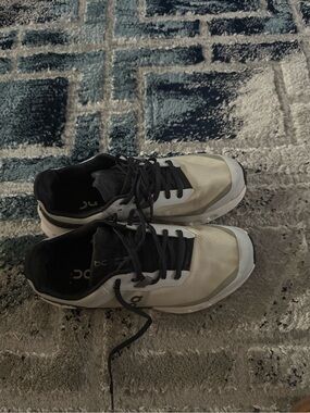 On Running White and Black Performance Running Shoes